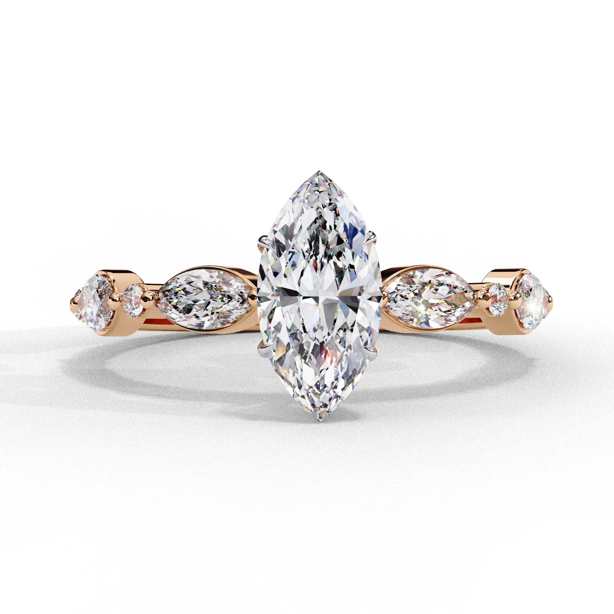 Front view of a rose gold marquise cut diamond engagement ring with alternating marquise and round brilliant side stones.