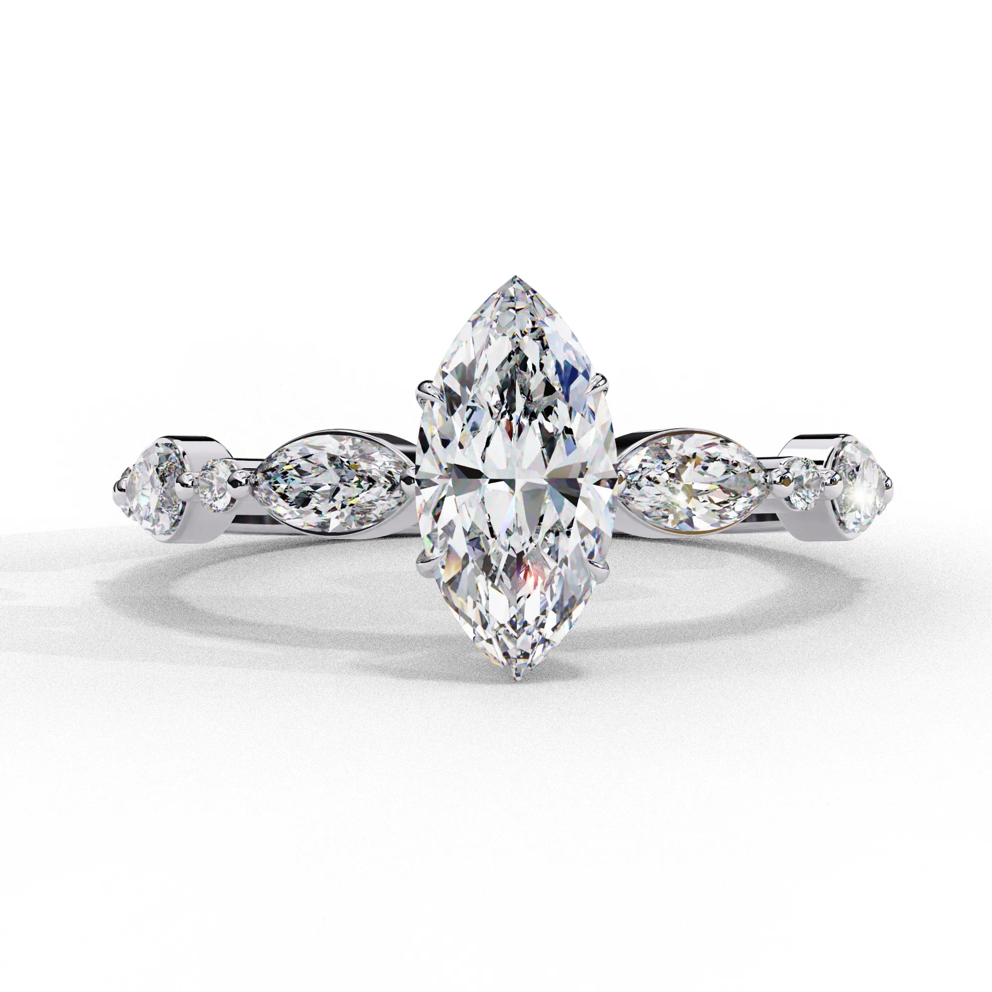 Front view of a white gold marquise cut diamond engagement ring with alternating marquise and round brilliant side stones.