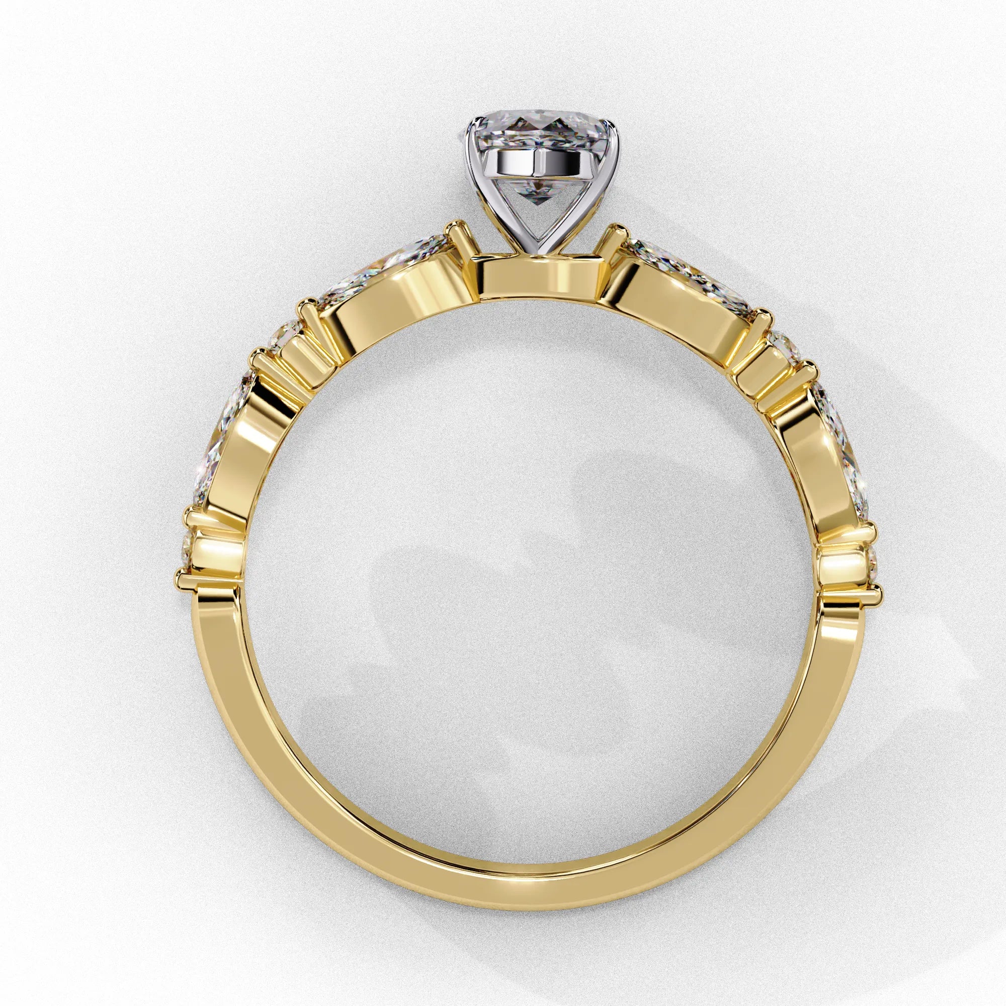 Side profile view of a yellow gold marquise cut diamond engagement ring showing the cathedral setting layout.