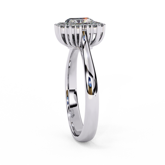 : Side profile view of a white gold art deco emerald halo diamond ring.