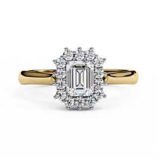 : Front-facing view of a yellow gold art deco emerald halo diamond ring.
