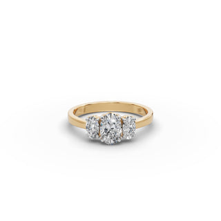 1.01 ct Oval Lab Grown Diamond Three Stone Ring in yellow gold, front view