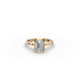 1.5 ct Emerald Lab Grown Diamond Bezel Solitaire Ring in yellow gold, front view