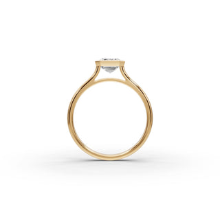 1.5 ct Emerald Lab Grown Diamond Bezel Solitaire Ring in yellow gold, view 2