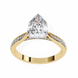 Gold ring with a pear-shaped diamond on a white background