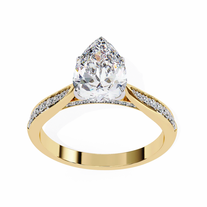 Gold ring with a pear-shaped diamond on a white background
