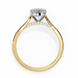 Gold ring with a diamond on a white background
