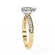 Gold ring with diamond accents on a white background