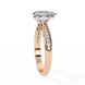 Rose gold ring with diamond accents on a white background
