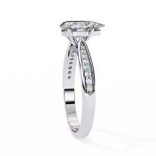 Silver ring with a diamond on a white background