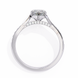 Silver ring with a diamond on a white background