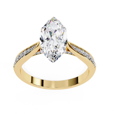 Gold ring with a pear-shaped diamond on a white background