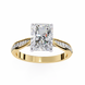 Gold ring with a large diamond and smaller diamonds on the band against a white background