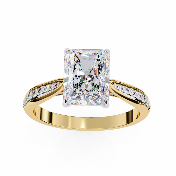 Gold ring with a large diamond and smaller diamonds on the band against a white background