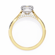 Gold ring with a diamond on a white background