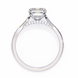 Silver ring with a large diamond and smaller diamonds on the band against a white background