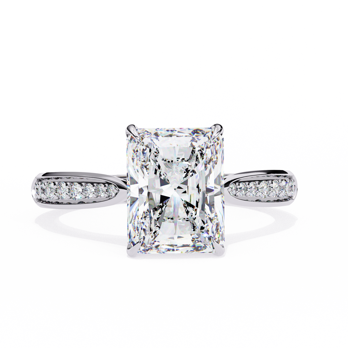 Diamond ring with a rectangular center stone on a white background