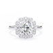 Diamond ring with a floral halo on a white background