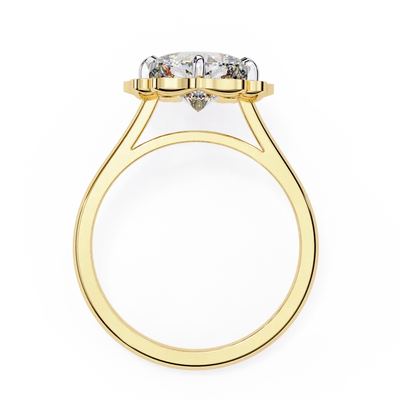 Gold ring with a diamond on a white background