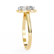 Gold ring with three diamonds on a white background