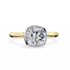 Gold ring with a large diamond on a white background