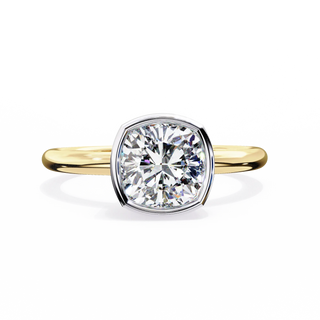 Gold ring with a large diamond on a white background