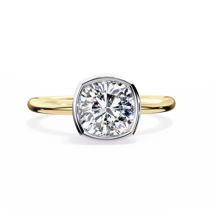 Gold ring with a large diamond on a white background