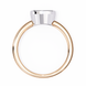 Two-toned ring with gold and silver design on a white background