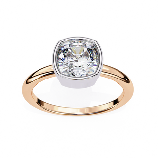 Gold ring with a large diamond on a white background