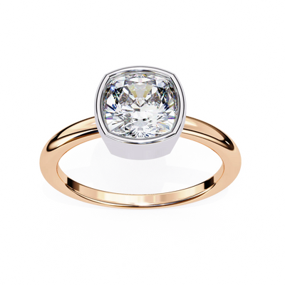 Gold ring with a large diamond on a white background