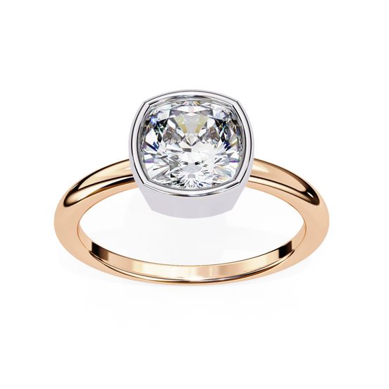Gold ring with a large diamond on a white background
