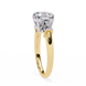 Gold ring with a diamond on a white background