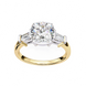 Gold and silver ring with a large diamond on a white background