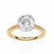 Gold ring with a large diamond and smaller diamonds on the band against a white background