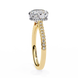 Gold ring with a diamond on a white background