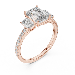 emerald diamond three-stone pavé ring in rose gold
