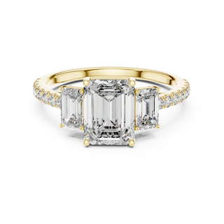 emerald diamond three-stone pavé ring in yellow gold
