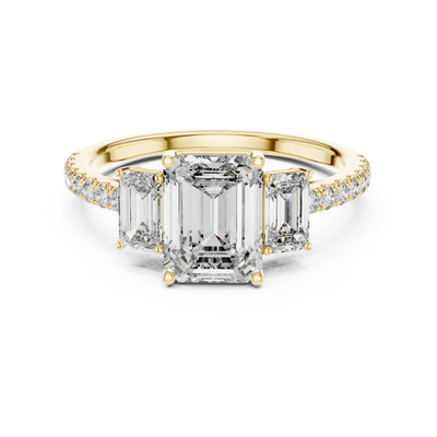 emerald diamond three-stone pavé ring in yellow gold
