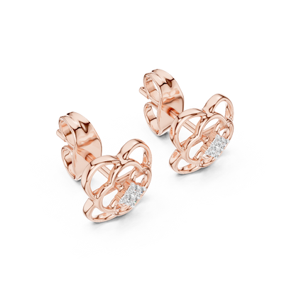 Side profile of rose gold openwork flower petal diamond studs.