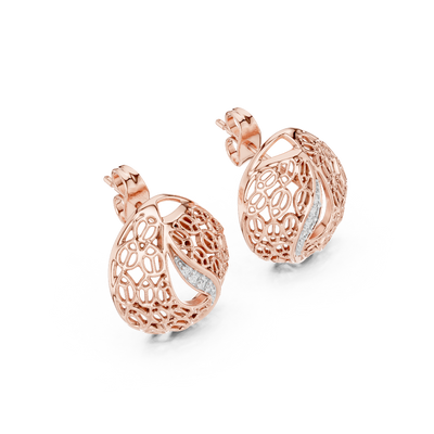 Side profile of rose gold intricate lace-inspired diamond studs.