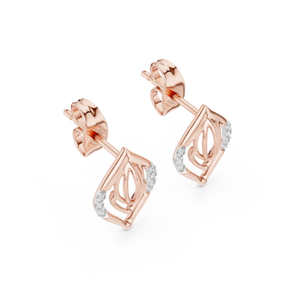 Side profile of rose gold layered silhouette diamond stud earrings.