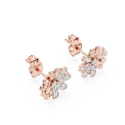 Side profile of rose gold flower petal diamond stud earrings.