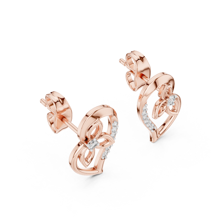 Side profile of rose gold heart-shaped diamond stud earrings with floral motif.