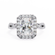 Diamond ring with a large central gemstone and smaller stones on a white background