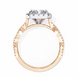 Rose gold ring with a diamond on a white background