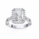Diamond ring with a central gemstone and smaller diamonds on a white background