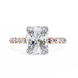 Diamond ring with a large central gemstone and smaller stones on a white background