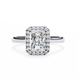 Diamond ring with a rectangular stone on a white background