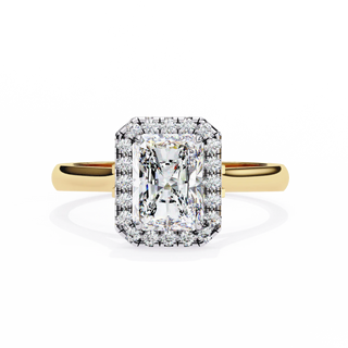 Rose gold ring with a large diamond and smaller diamonds on a white background