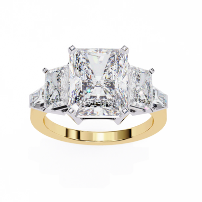 Gold ring with three large diamonds on a white background